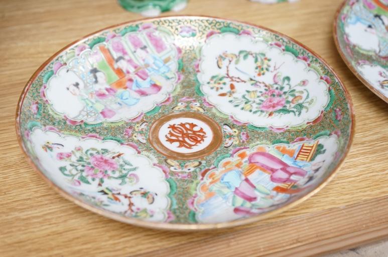 Five Chinese famille rose plates, Guangxu period and a pair of Chinese figures, 25cm in diameter. Condition - fair to good